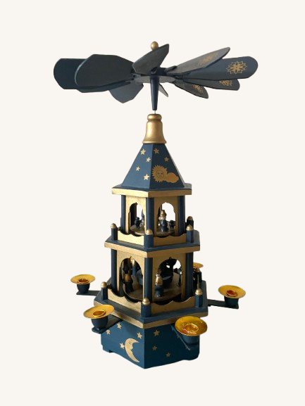 Gammel blå Weihnachtspyramide med sol, stjerner og måne / Julekarrusel